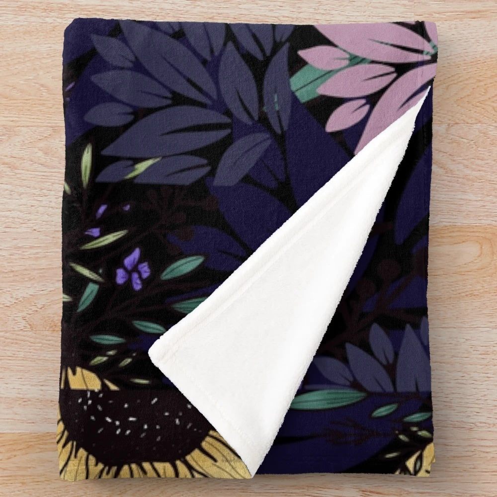 Floral black plush blanket with soft, cozy fabric