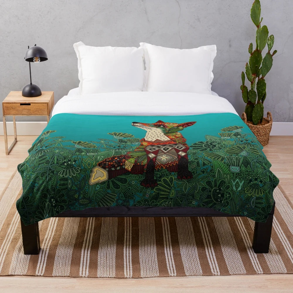Floral fox plush blanket with botanical, geometric, and tribal patterns in teal, turquoise, and green colors