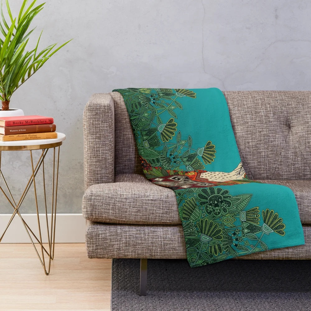 Floral fox plush blanket with botanical, geometric, and tribal patterns in teal, turquoise, and green colors