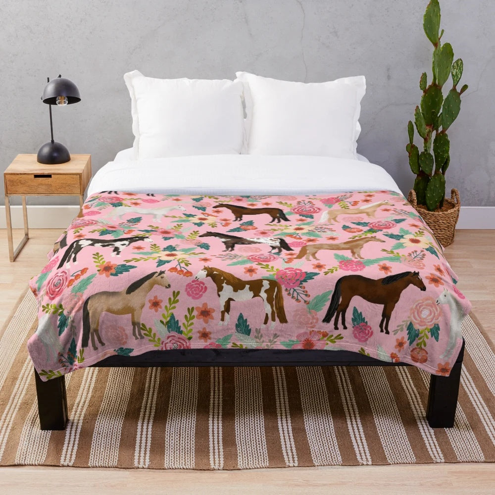 Soft and warm plush blanket featuring a floral pattern with different horse breeds