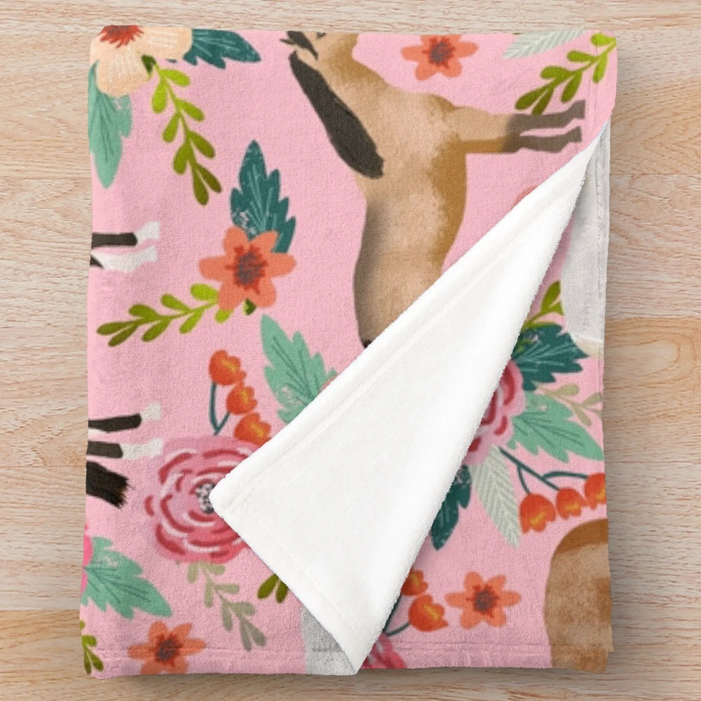 Soft and warm plush blanket featuring a floral pattern with different horse breeds