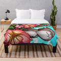 Soft and plush floral kitten blanket for spring