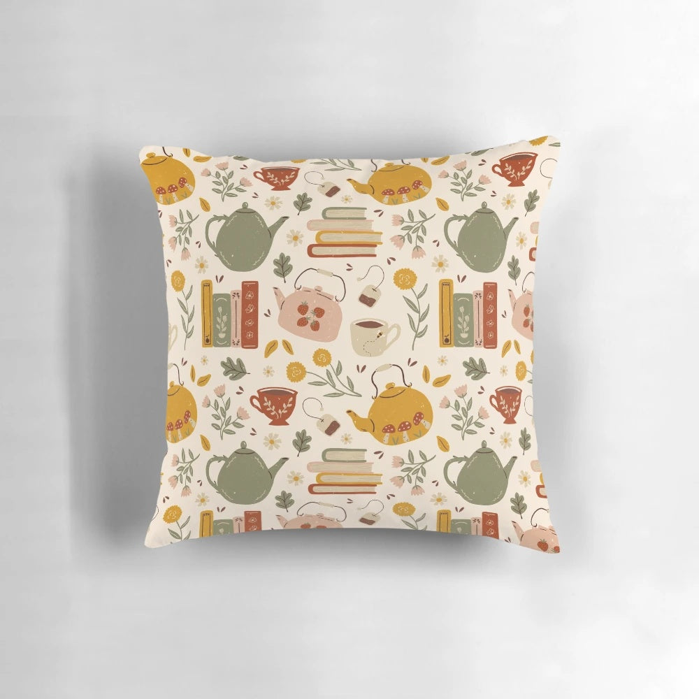 A cozy, floral-patterned pillow perfect for reading and tea time.