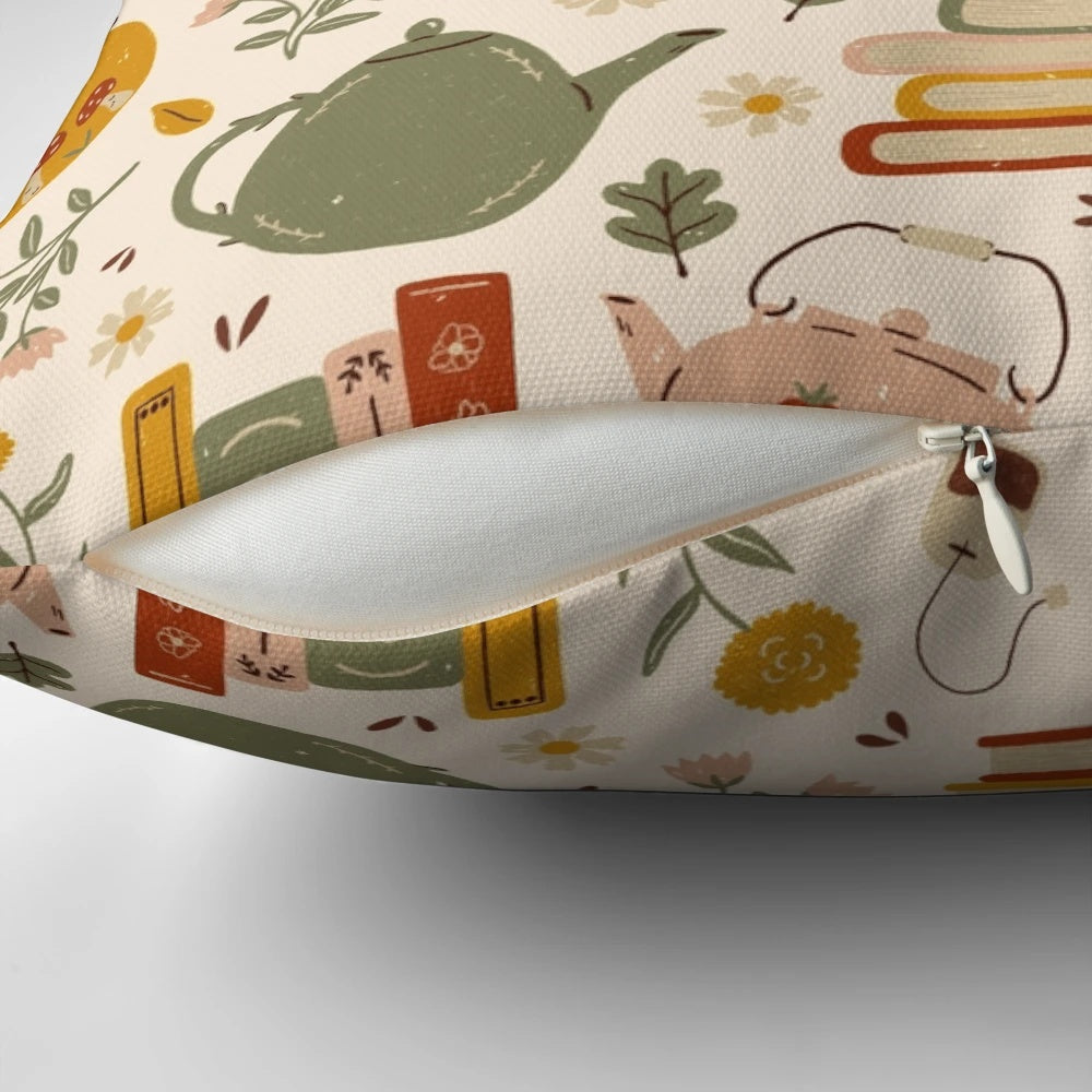 A cozy, floral-patterned pillow perfect for reading and tea time.