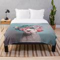 Soft and cuddly floral plush blanket perfect for dog lovers