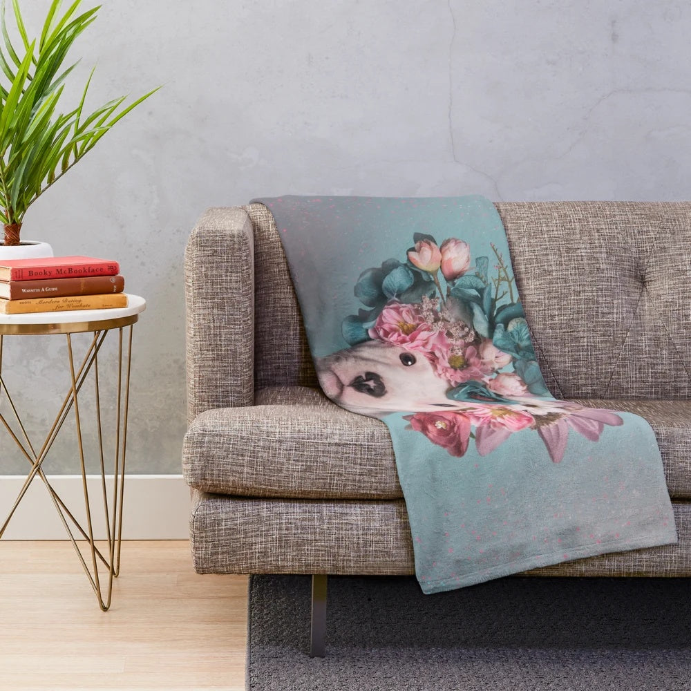 Soft and cuddly floral plush blanket perfect for dog lovers