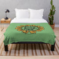 Gardening-themed plush blanket with floral design
