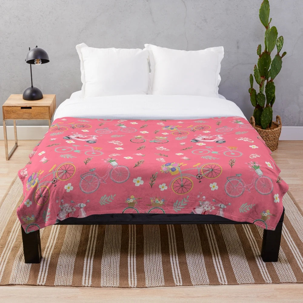 Colorful spring flowers and biking design on a plush blanket