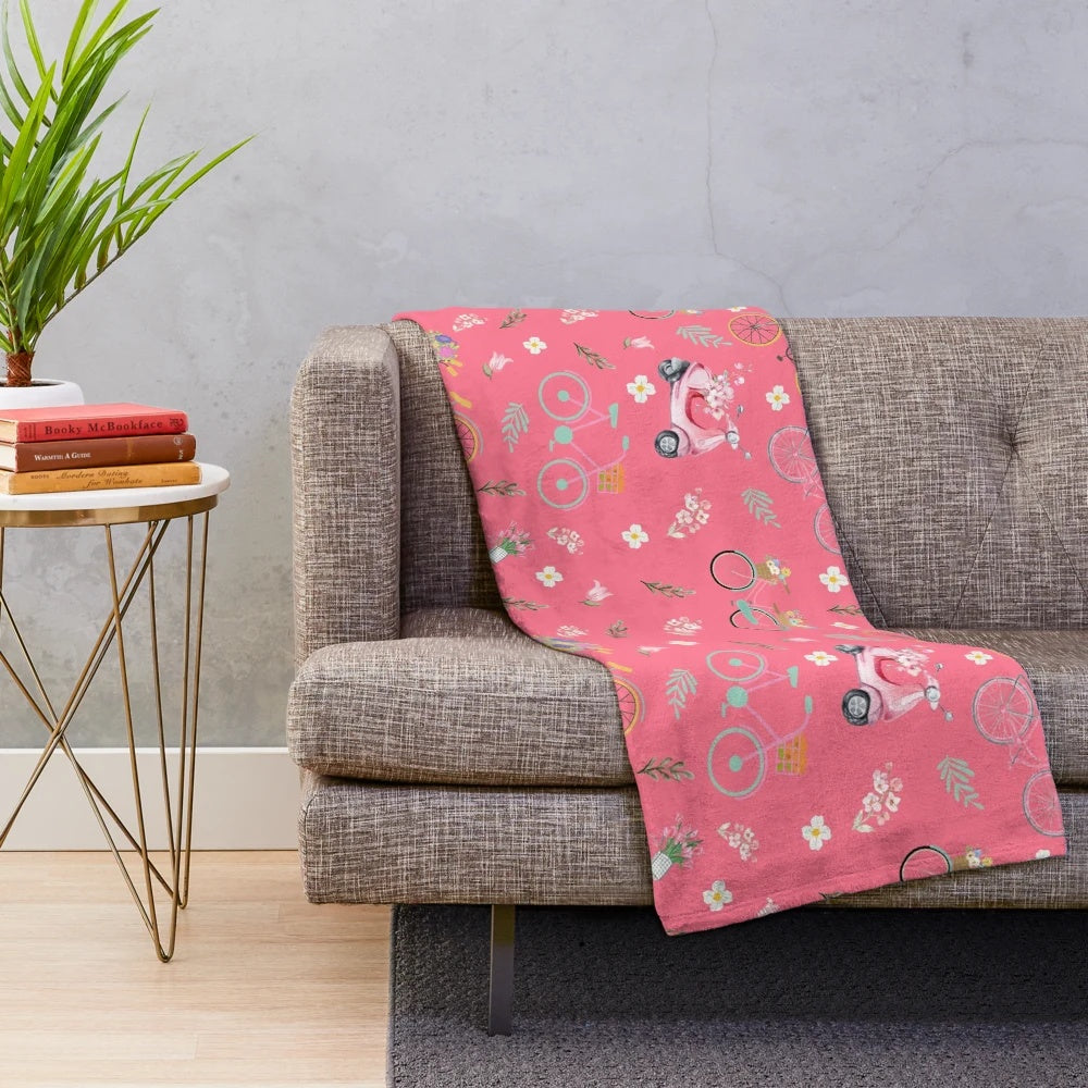 Colorful spring flowers and biking design on a plush blanket