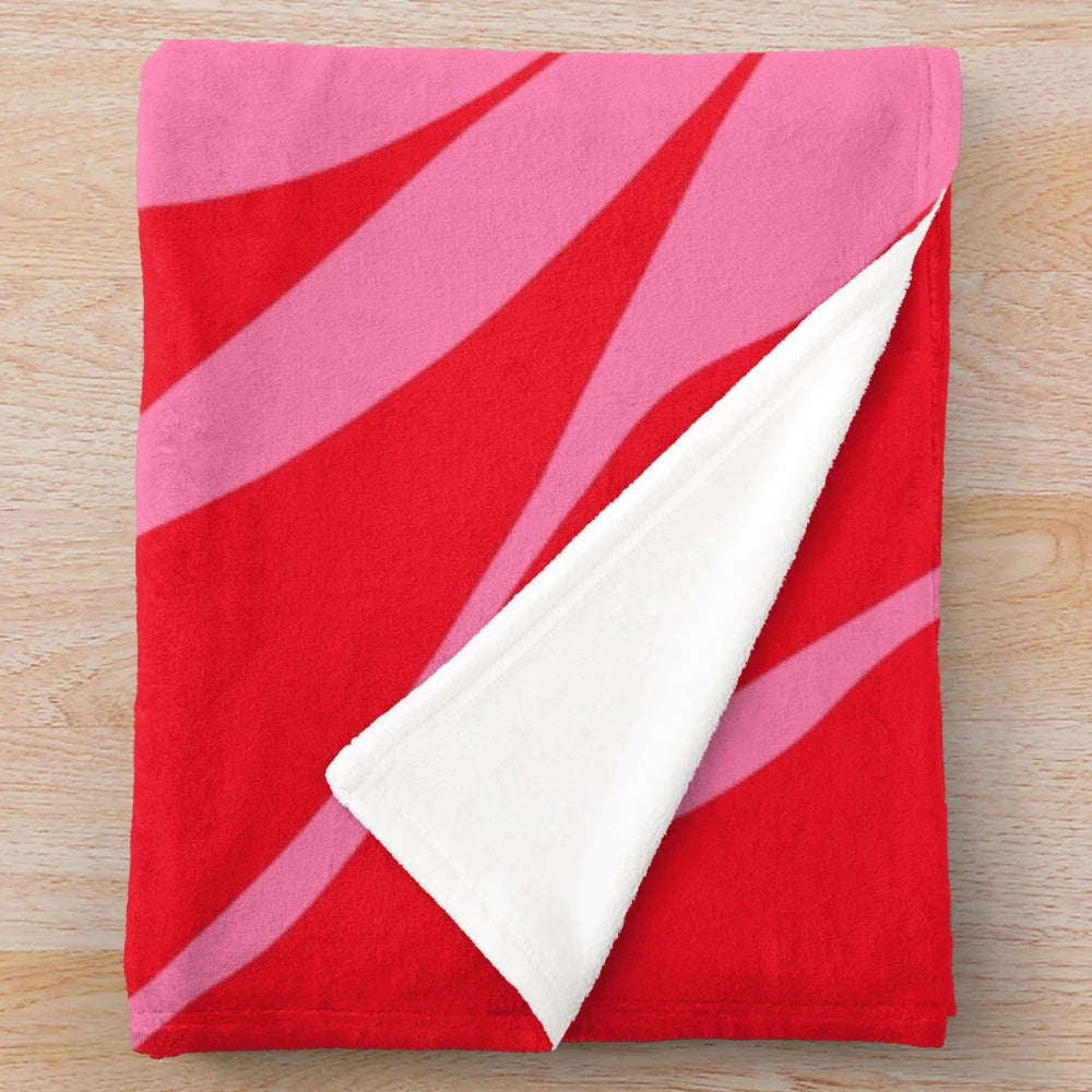 Pink and red leaf patterned plush blanket