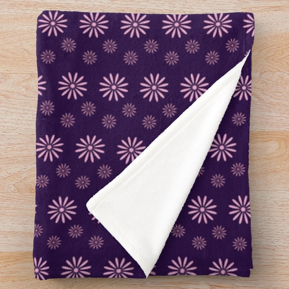 Small pink and purple floral print plush blanket