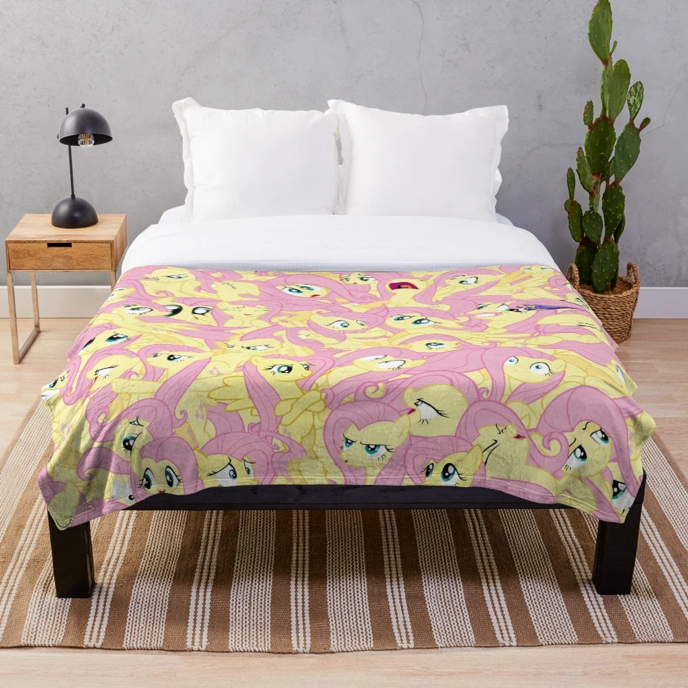 Fluttershy-themed plush blanket featuring vector art design