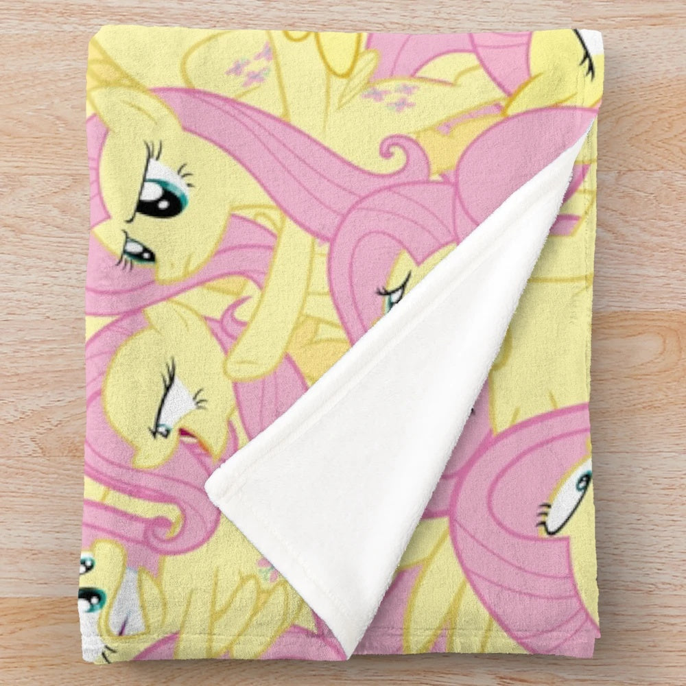 Fluttershy-themed plush blanket featuring vector art design