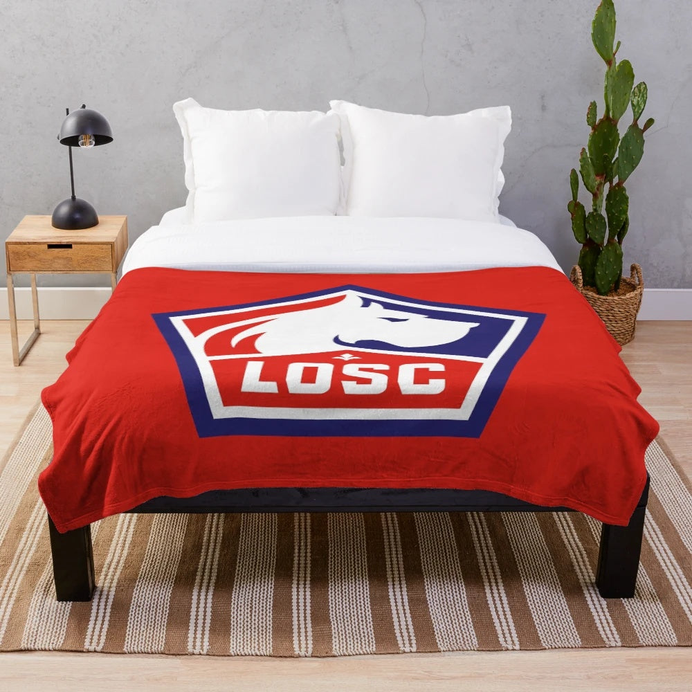 Plush football-themed blanket for sports fans