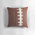 Soft, plush football-shaped pillow for home decor and sports enthusiasts