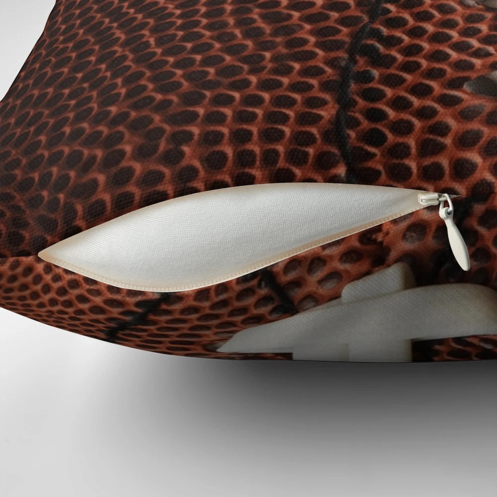 Soft, plush football-shaped pillow for home decor and sports enthusiasts