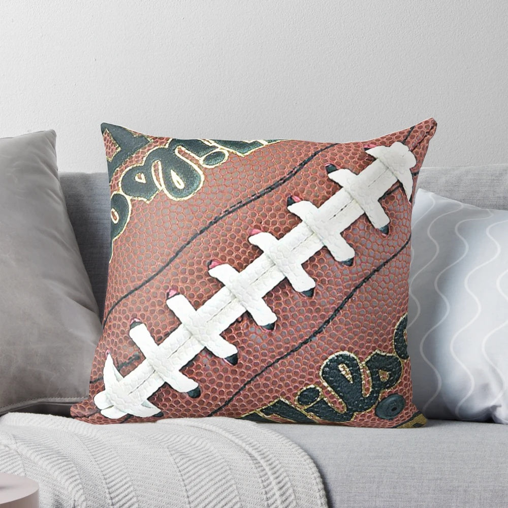 A comfortable throw pillow featuring a football design, perfect for decorating a man cave or sports-themed space.
