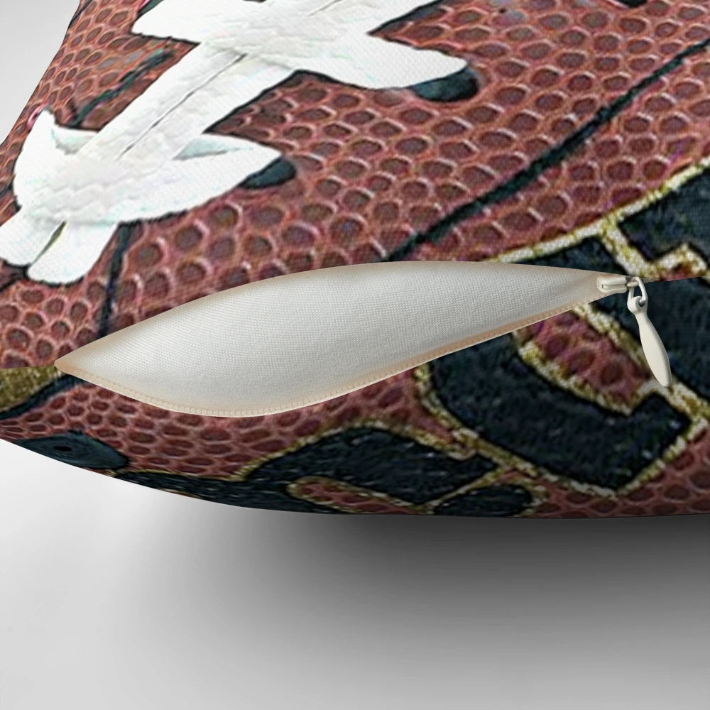 A comfortable throw pillow featuring a football design, perfect for decorating a man cave or sports-themed space.