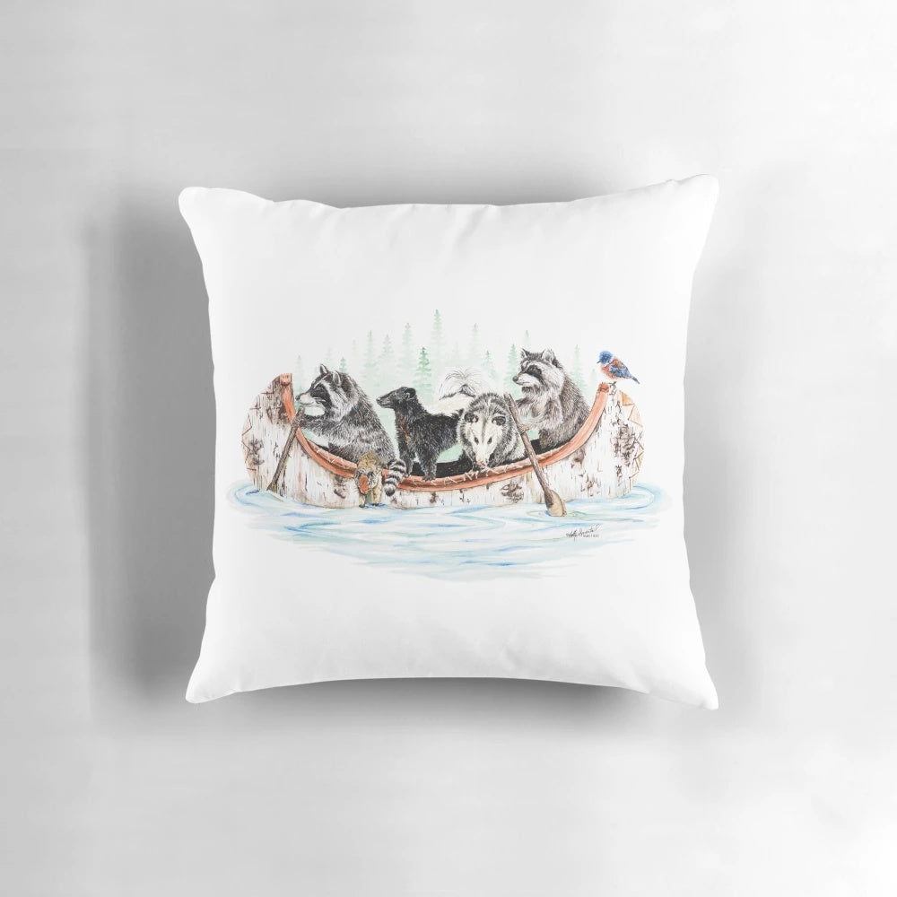 A colorful and whimsical pillow featuring a group of forest animals in a canoe, perfect for nature and wildlife enthusiasts.