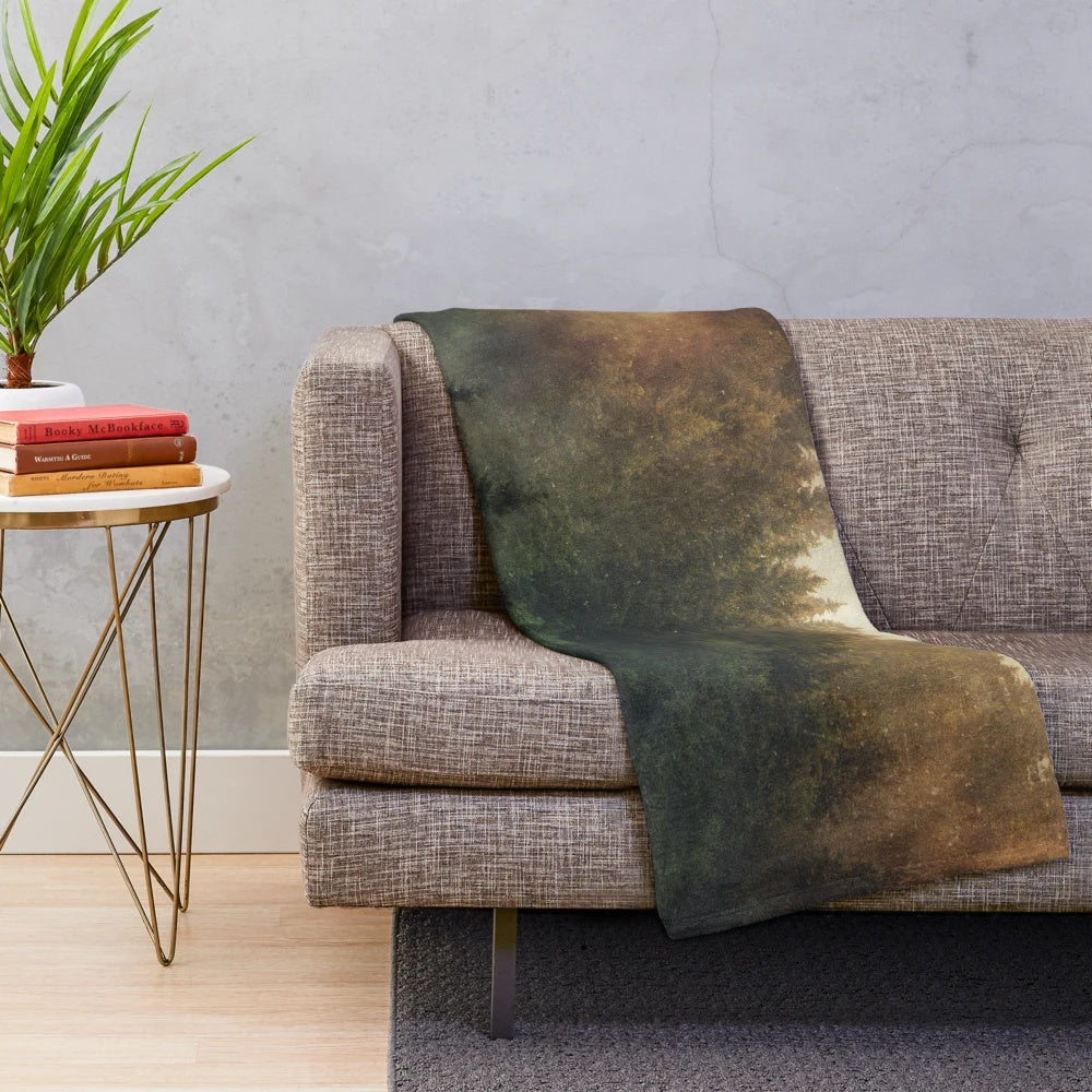 Plush blanket featuring a fairytale forest scene with trees, fog, and a dreamy, nostalgic atmosphere