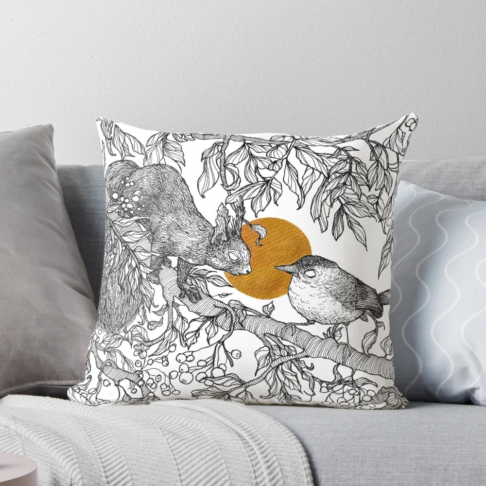Decorative pillow featuring a squirrel and bird in a forest setting
