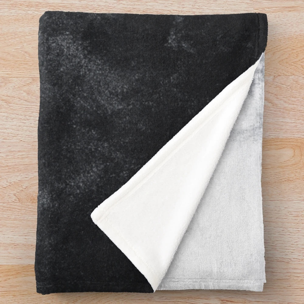 Plush blanket with a nature-inspired, gothic design featuring forests, trees, and fog