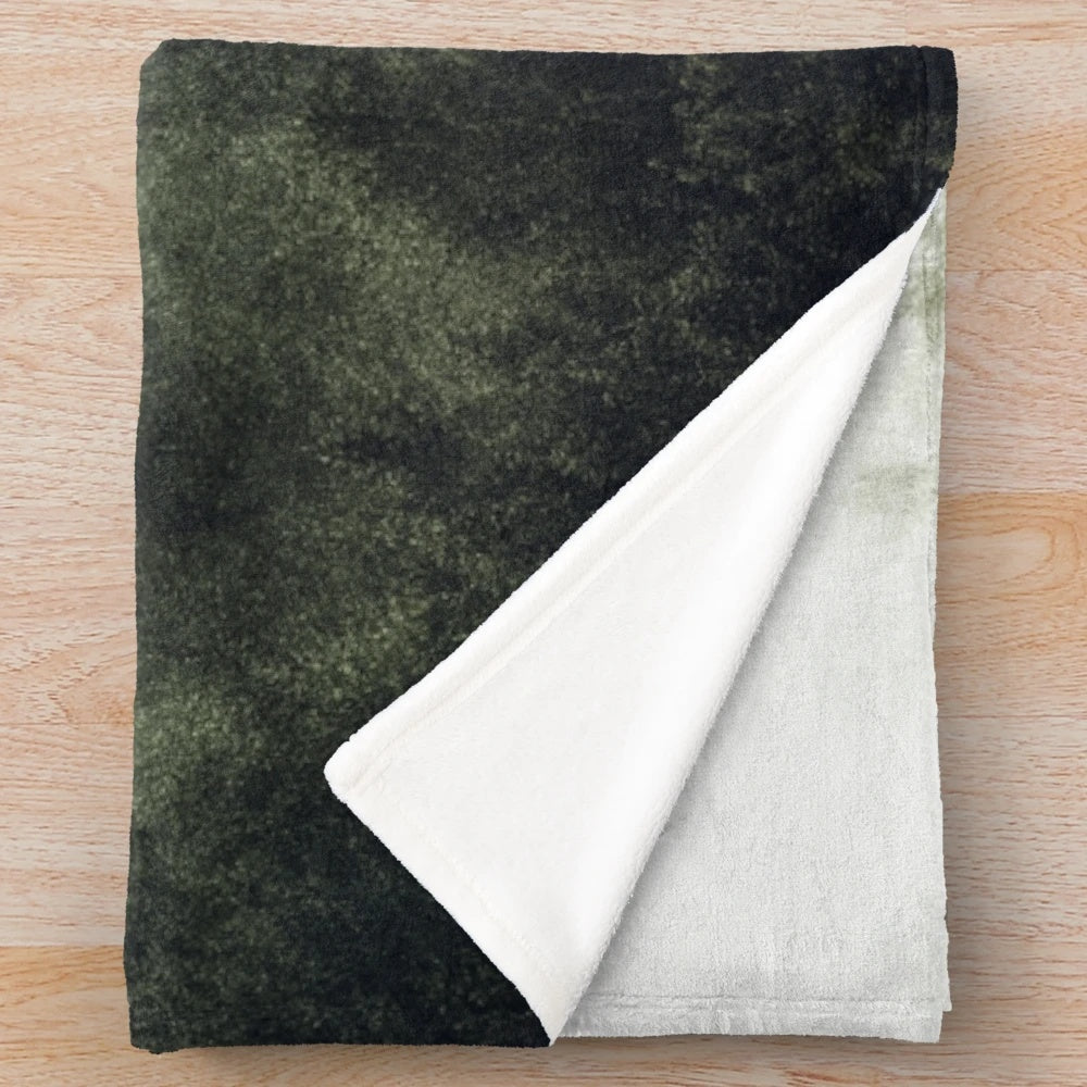Plush blanket with a scenic forest landscape design