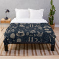 Forest-themed plush blanket with nature motifs