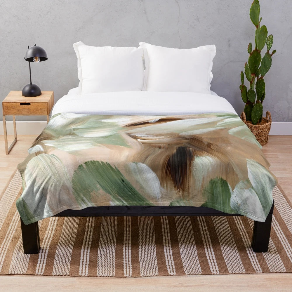 Plush abstract green and brown blanket with earthy forest-inspired patterns