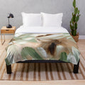 Plush abstract green and brown blanket with earthy forest-inspired patterns
