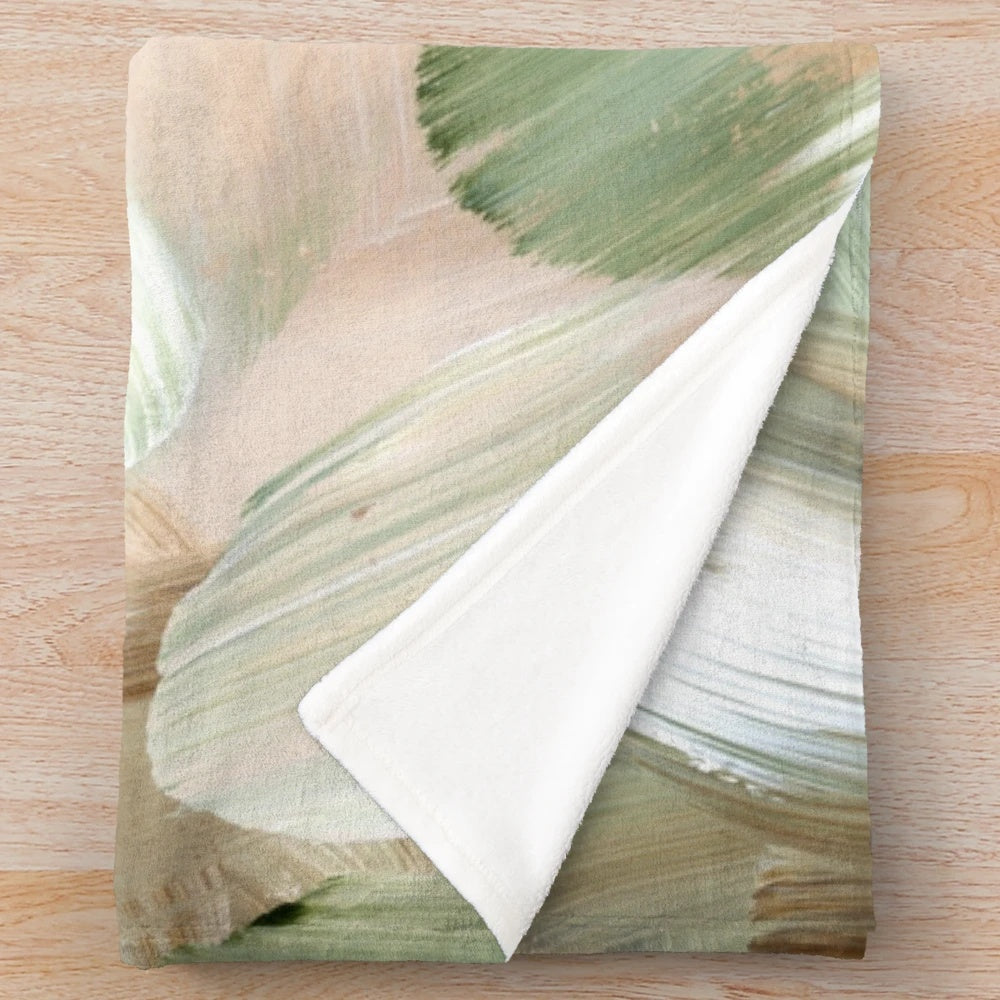 Plush abstract green and brown blanket with earthy forest-inspired patterns