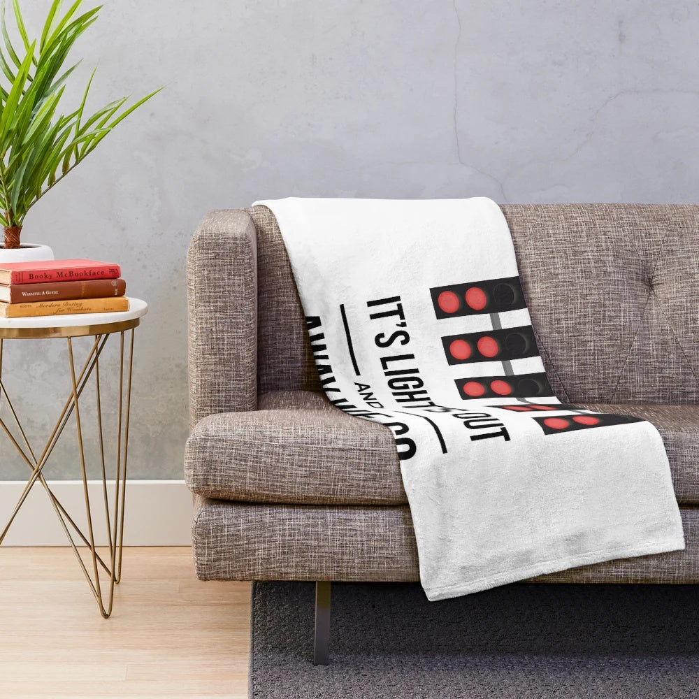 Formula One inspired plush blanket with "It's Lights Out and Away We Go" design