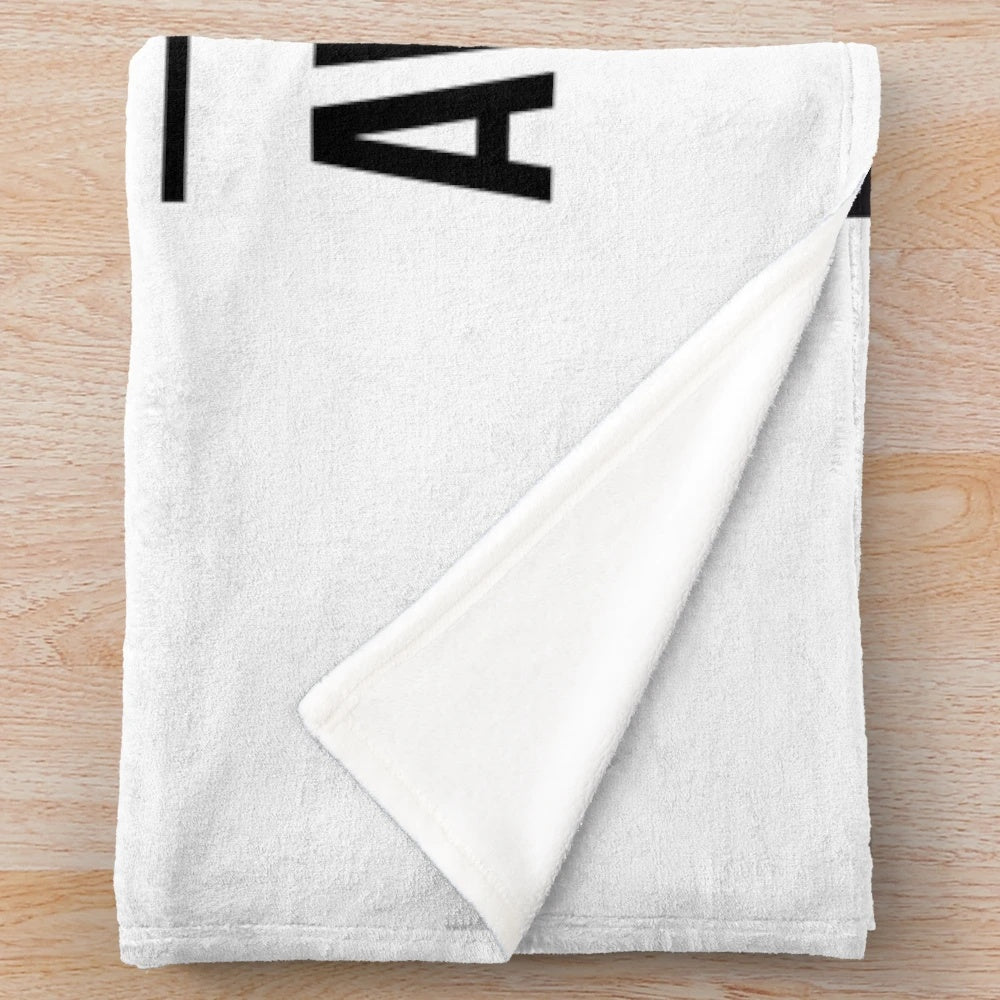 Formula One inspired plush blanket with "It's Lights Out and Away We Go" design