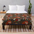 Plush blanket with a nature-inspired fox and floral pattern design