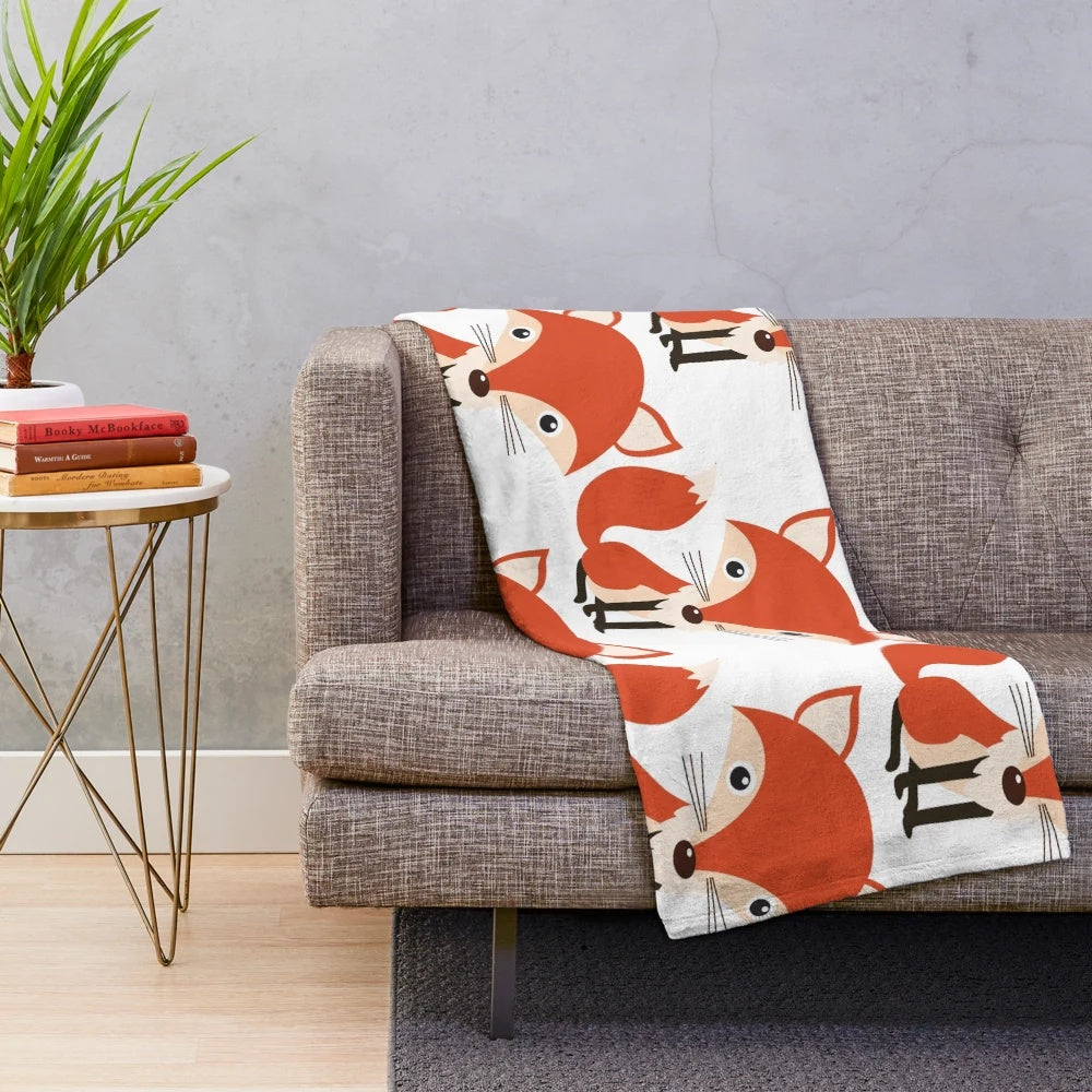 Colorful fox plush blanket with a whimsical watercolor pattern
