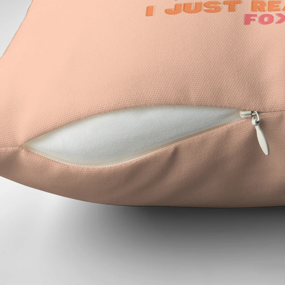 Orange throw pillow with a playful fox design, perfect for decorating your home or gifting to a fox enthusiast.