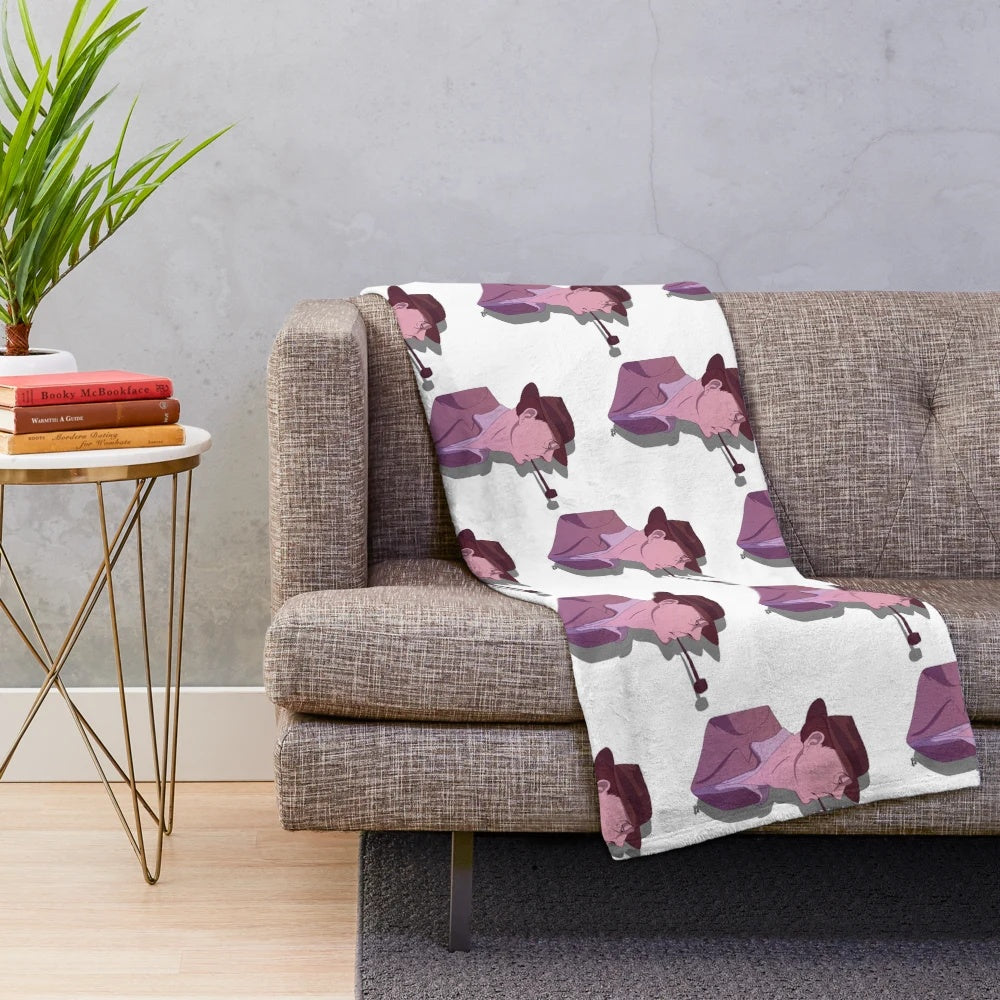 A plush and comfortable blanket inspired by the iconic French cinema character, Monsieur Hulot.
