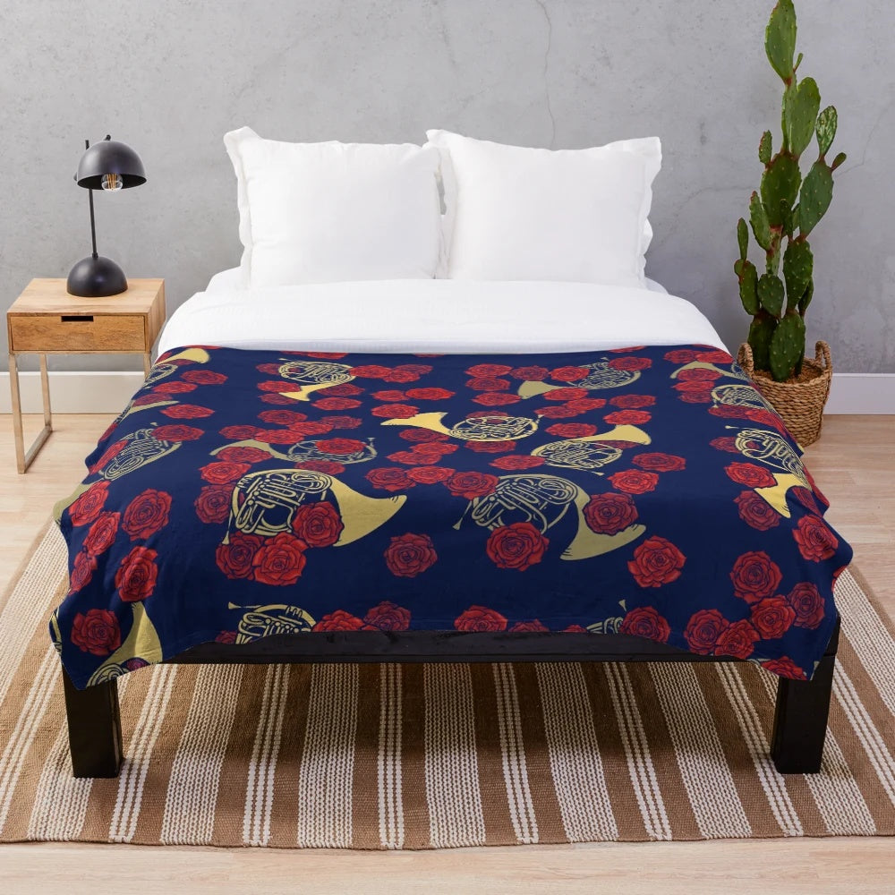 French horn and roses printed on a soft, plush blanket