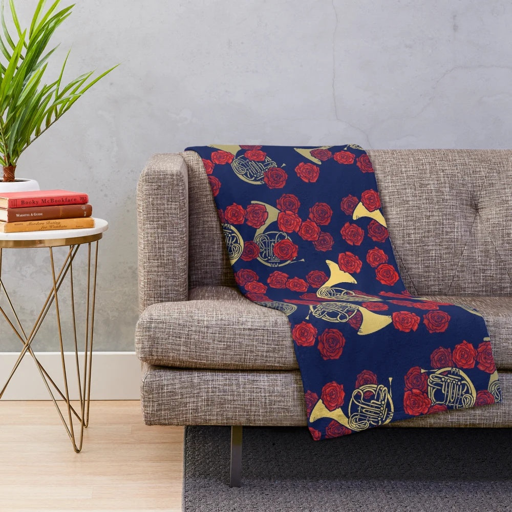French horn and roses printed on a soft, plush blanket
