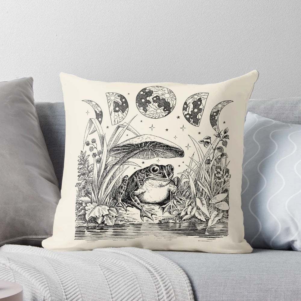 Vintage-style throw pillow featuring a whimsical frog sitting on a toadstool by a moonlit pond
