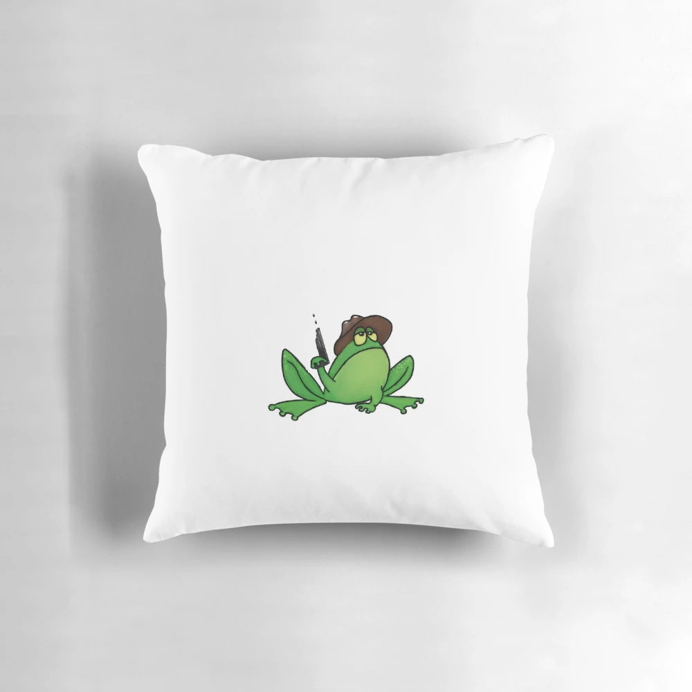 A green decorative pillow with a cute frog design, perfect for a western-inspired home.