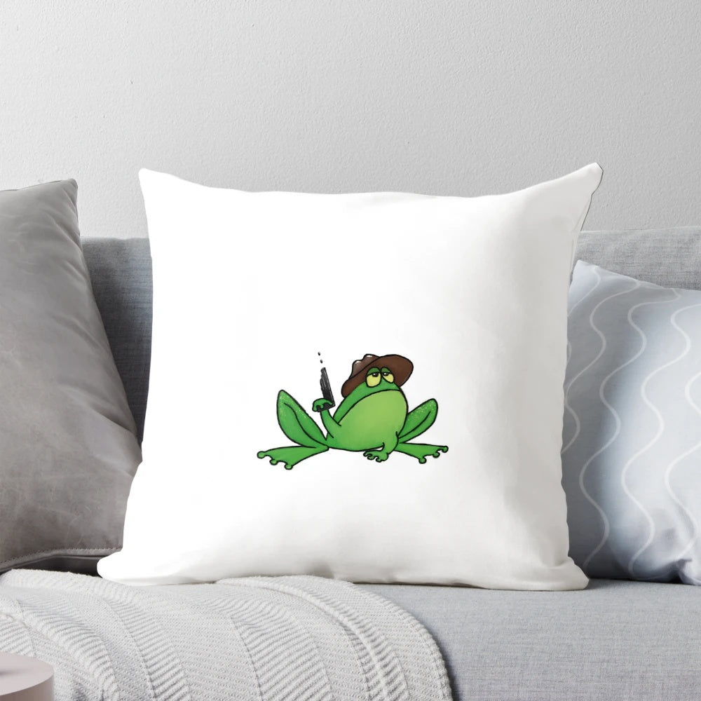 A green decorative pillow with a cute frog design, perfect for a western-inspired home.