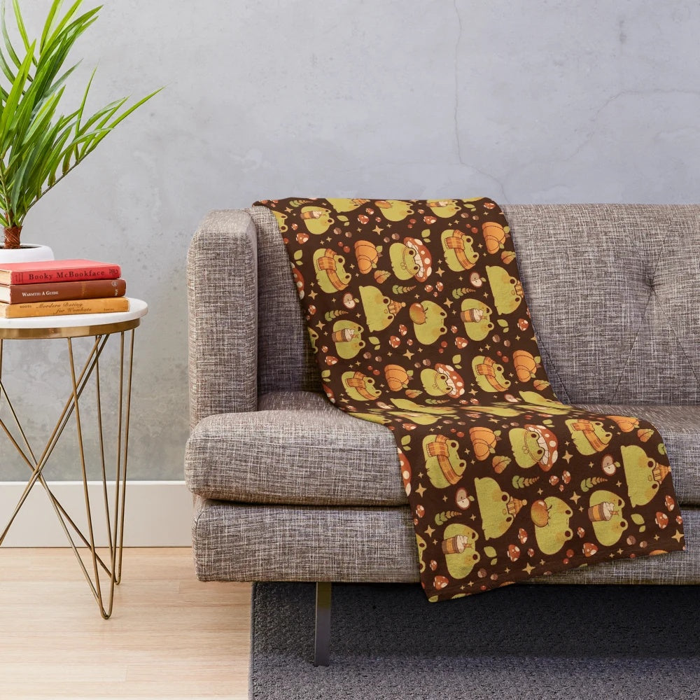 Plush blanket featuring a cute frog design, perfect for fall and Halloween