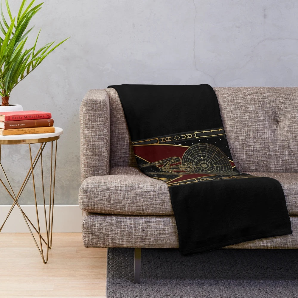 Plush blanket with a space-themed design