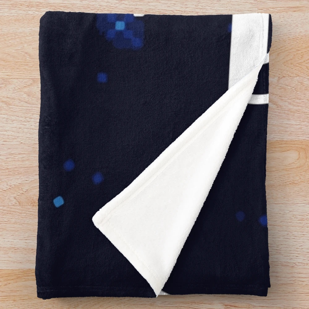 Plush blanket with a galaxy and stars design