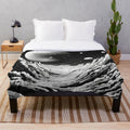 Soft and plush galaxy-themed blanket for a cozy, celestial experience