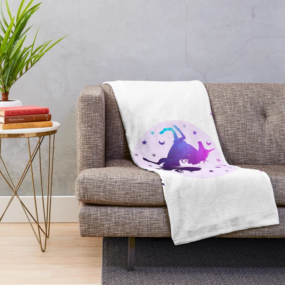Cozy and soft plush unicorn blanket with galaxy print design
