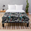 Plush gaming blanket featuring a retro game controller design