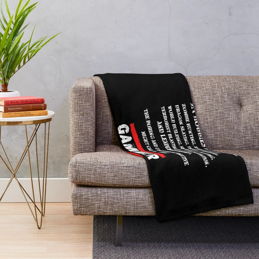 Plush blanket with gaming-themed design and text
