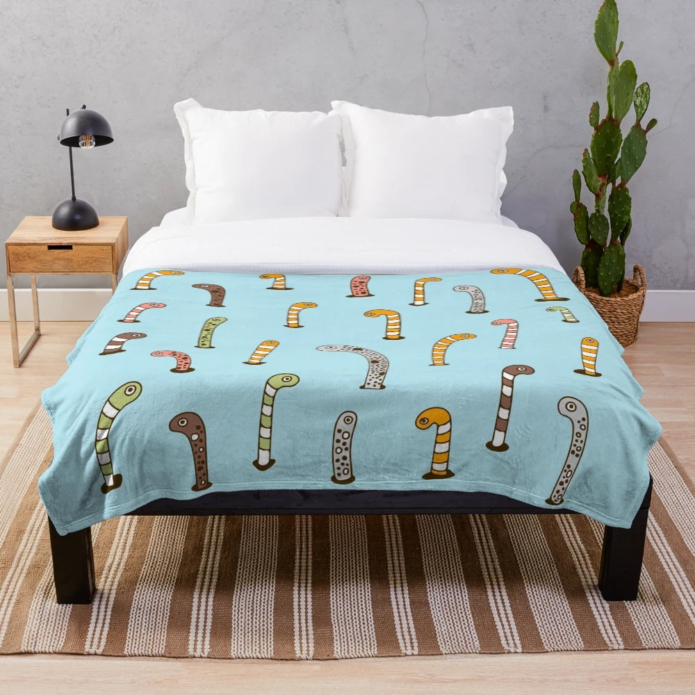 Colorful garden eels plush blanket with stripes and spots